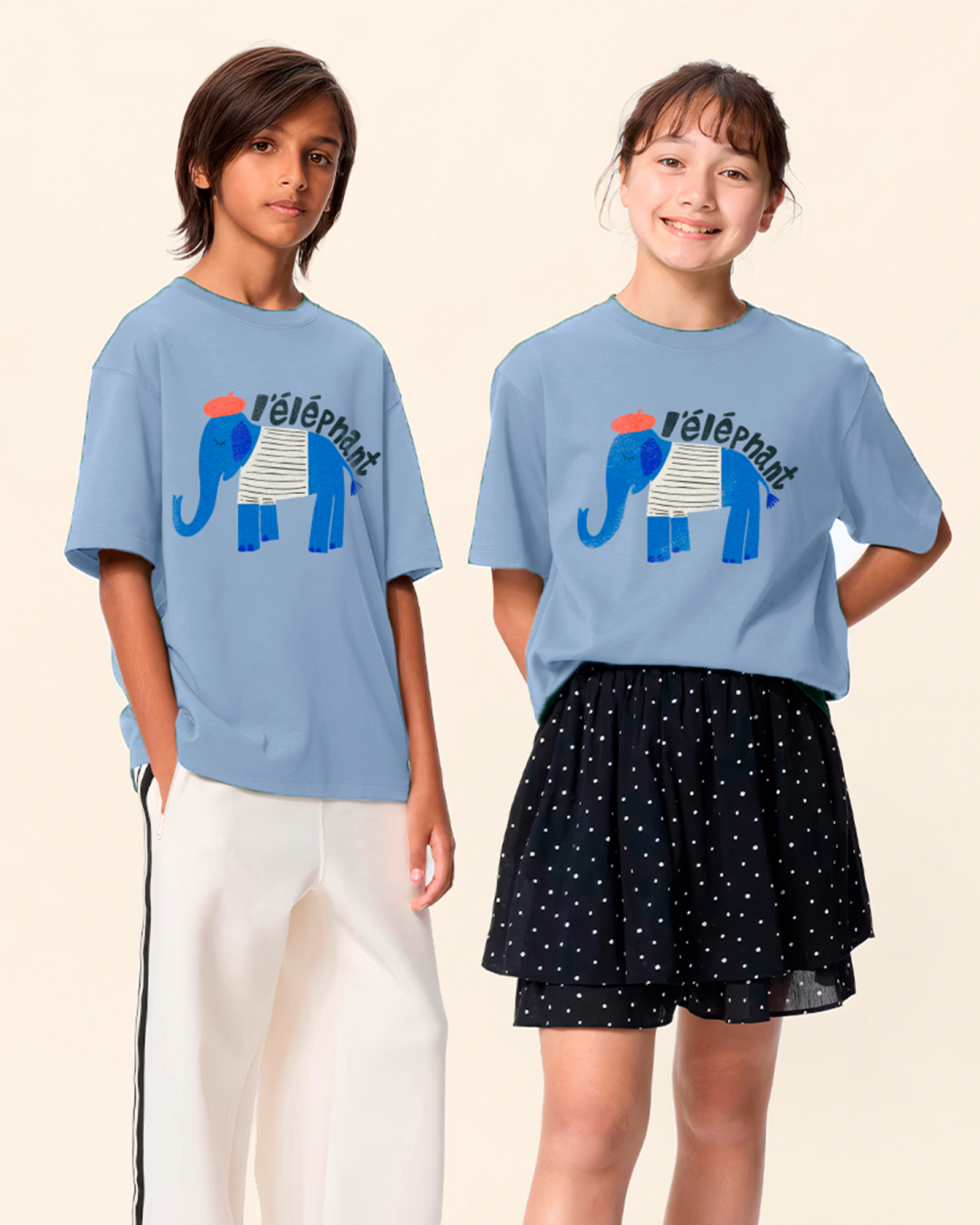 Two children wearing blue elephant T-shirts from the Lisbon Zoo collection